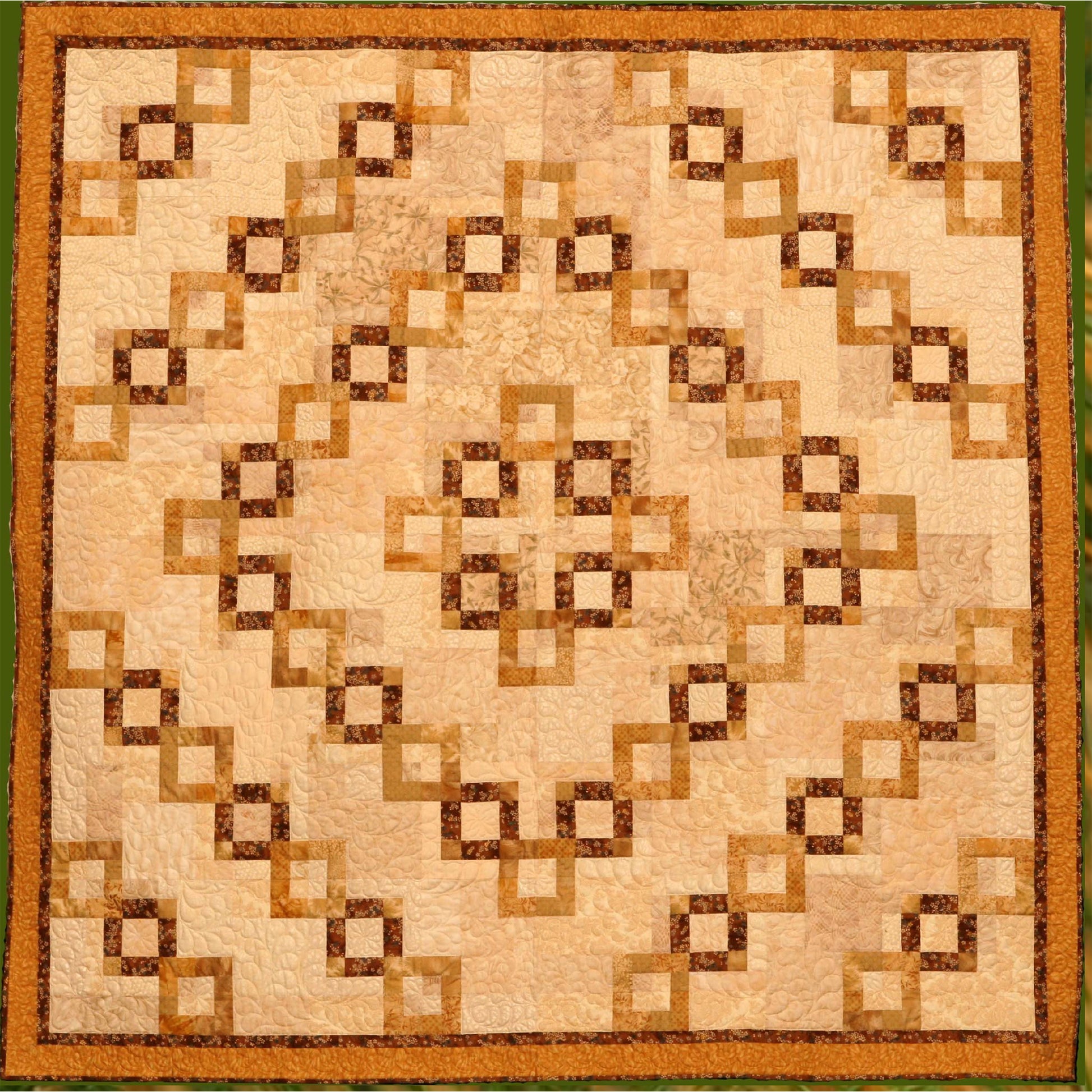 Golden chains make a romantic statement in this elegant and dramatic quilt.