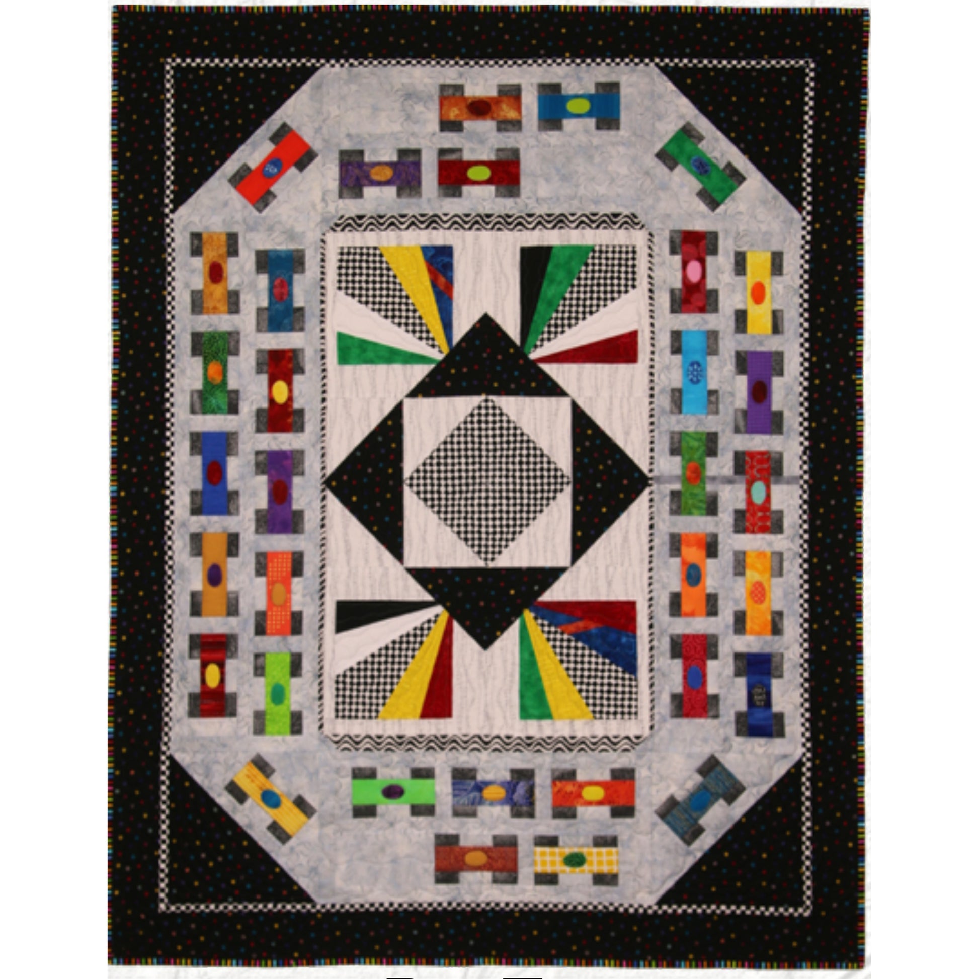 Fun Indie Car racing quilt features a colorful center with the different colored flags and the checker square in the center. The outside track includes lots of colorful race cars.