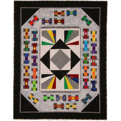Fun Indie Car racing quilt features a colorful center with the different colored flags and the checker square in the center. The outside track includes lots of colorful race cars.