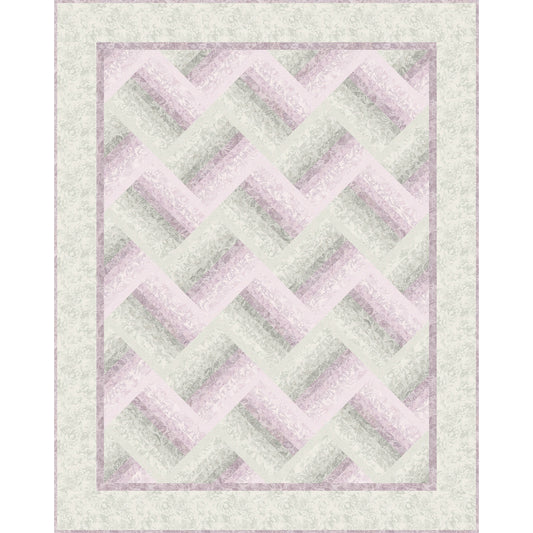 Quilt with a geometric pattern on a light green background