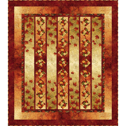 Quilt with autumn leaf pattern on a beige background