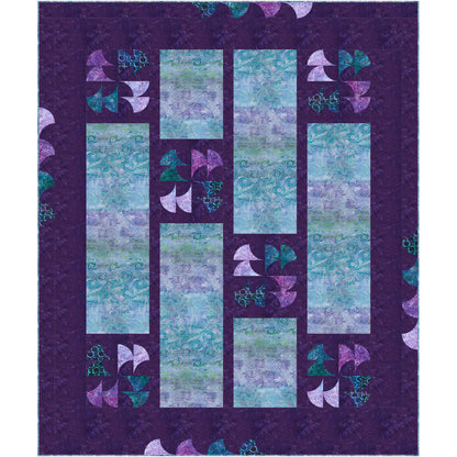 Colorful blue and purple rectangles quilt with intermingled swirls of color with dark purple background color.