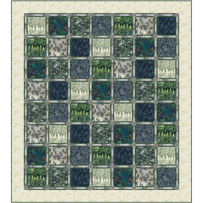 Colorful quilt with square flower and leaf pattern in shades of blue and green.