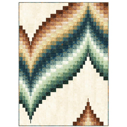 Geometric patterned quilt shape of wave from blocks in shades of brown, cream, yellow  and green.