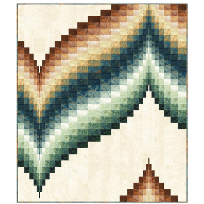 Geometric patterned quilt shape of wave from blocks in shades of brown, cream, yellow and green.