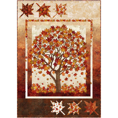 Fall, fun quilt features a panel with a tree full of bright red and orange leaves and has border including large colorful maple leaves.
