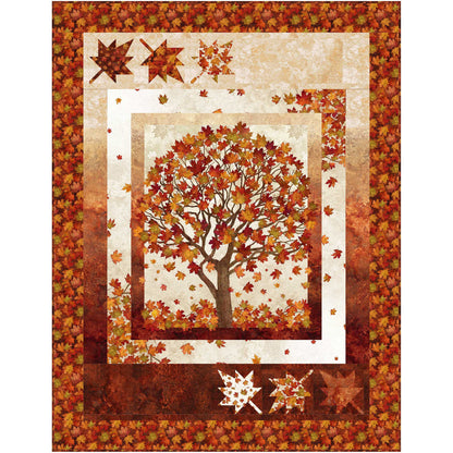 Fall, fun quilt features a panel with a tree full of bright red and orange leaves and has borders including large colorful maple leaves.