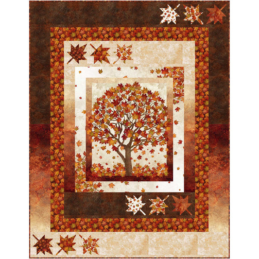 Fall, fun quilt features a panel with a tree full of bright red and orange leaves and has borders including more colorful maple leaves.