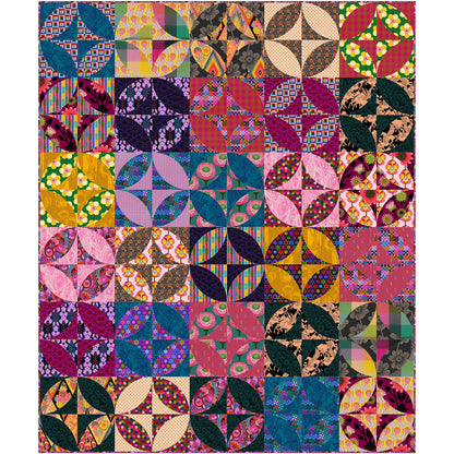 Fun quilt features colorful blocks of fabric with a circle and hour glass design for each.