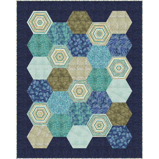 Quilt with blue and green hexagon design.