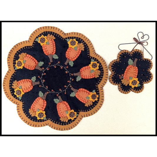 Get ready for the most beautiful time of the year with this lovely wool applique  11 inch candle mat and 5 inch mini mat!  Adorable pumpkins in a circle on candle mat.