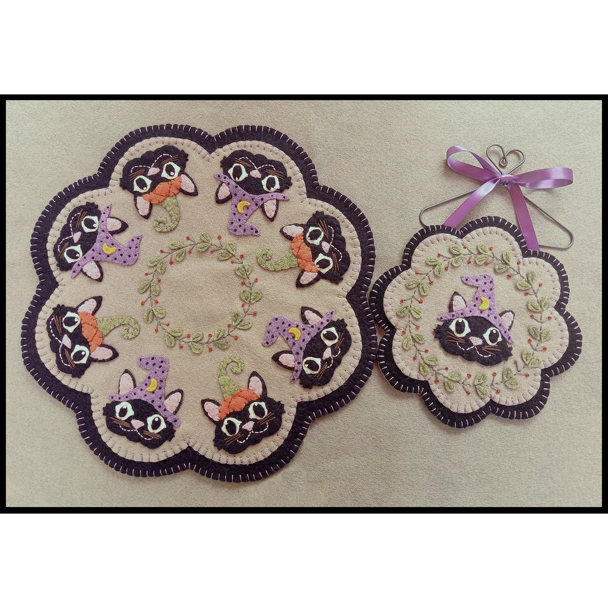 These adorable Halloween kitties are dressed in fun costumes and ready for Trick or Treating on this table mat and matching ornament.