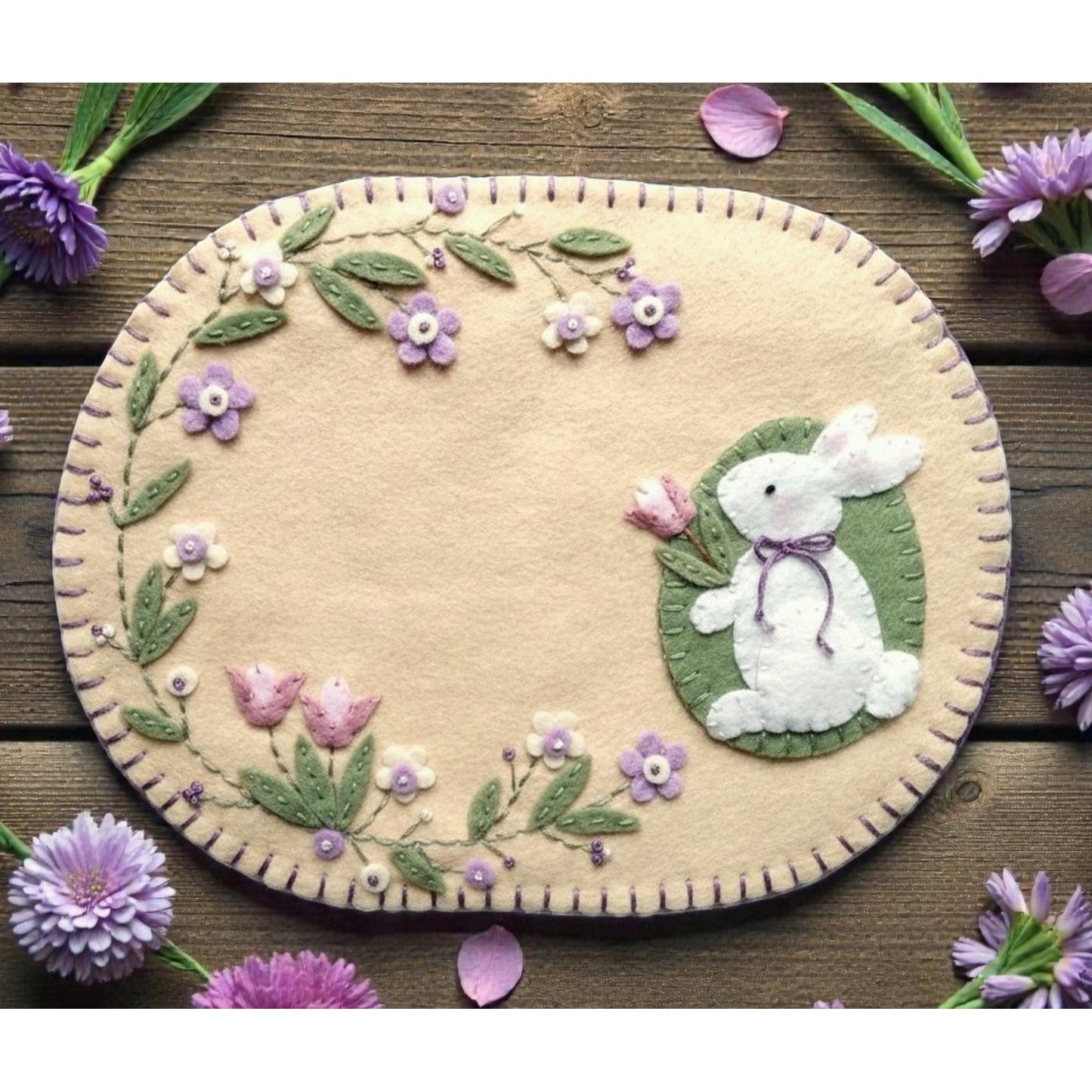 Adorable candle mat and mug rug with flowers border and cute bunny with a flower on the side.
