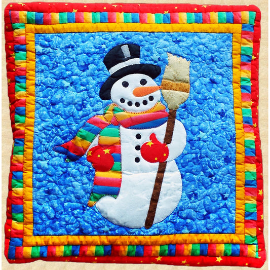 This whimsical Snowman Pillow in bright colors doesn't take long to make and adds holiday cheer to any home.