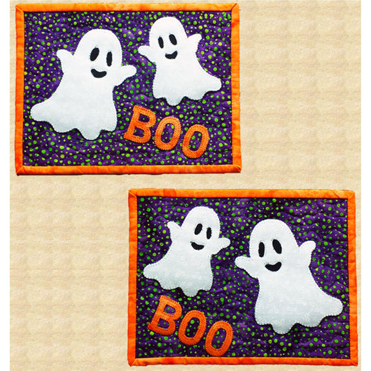 Two adorable ghosts and the letters for BOO on a mug rug. Two mug rugs shown.  So cute!