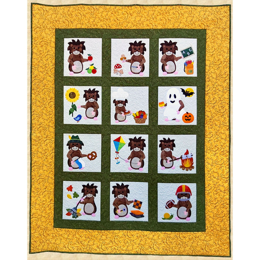 Adorable quilt with a cute hedgehog enjoying a number of different seasons in twelve different blocks. Blocks include picking fruit, with mushrooms, back to school with backpack and ABC on chalkboard, sunflower and bird, with chef's hat, pumpkin pie and basket of vegetables, dressed as a ghost with bat and jack o'lantern, dressed for Oktoberfest with hat, flag and pretzel, flying a kite, roasting marshmallows over a camp fire, racking leaves, quilting and playing football.