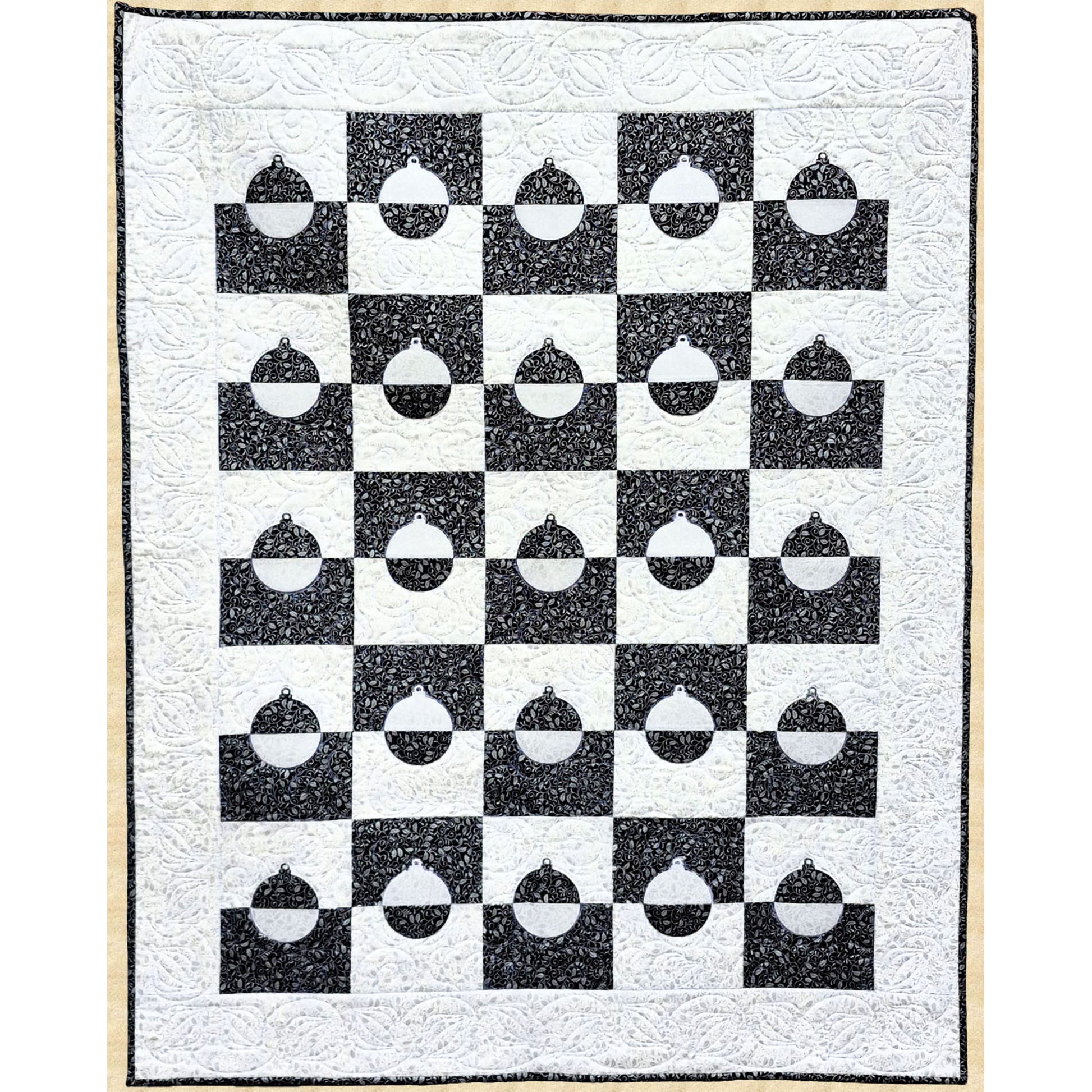 Beautiful black and white quilt features blocks of alternating black and white halves with half an ornament in black or white is included.  