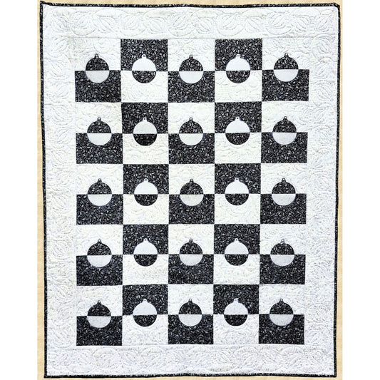Beautiful black and white quilt features blocks of alternating black and white halves with half an ornament in black or white is included.  