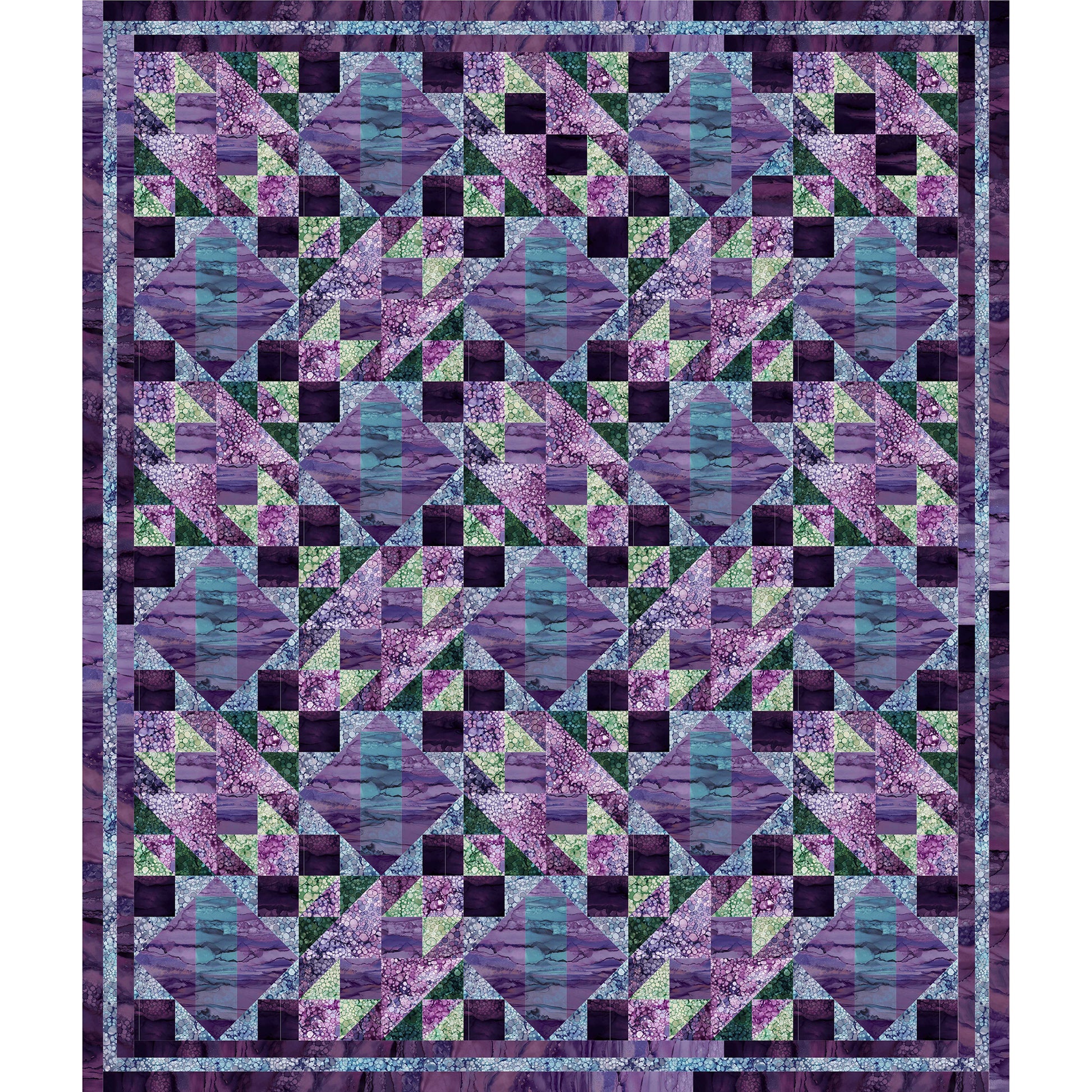 Fun quilt of different sized diamonds in different shades of blue, purple, and green fabric.