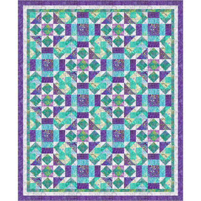 Emerald Delights quilt is a dreamy quilt with emerald, blue, teal and purple fabrics.