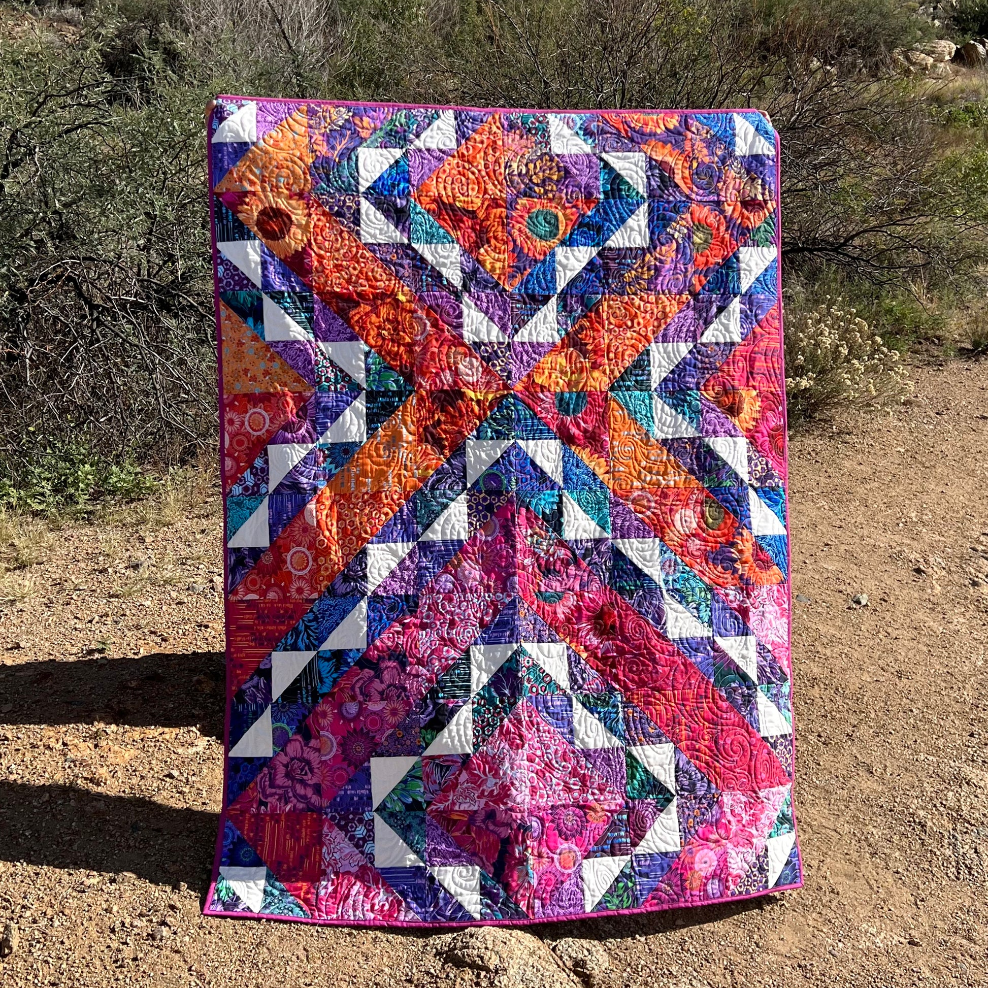 Alternate layout for Fading Day quilt with floral prints.