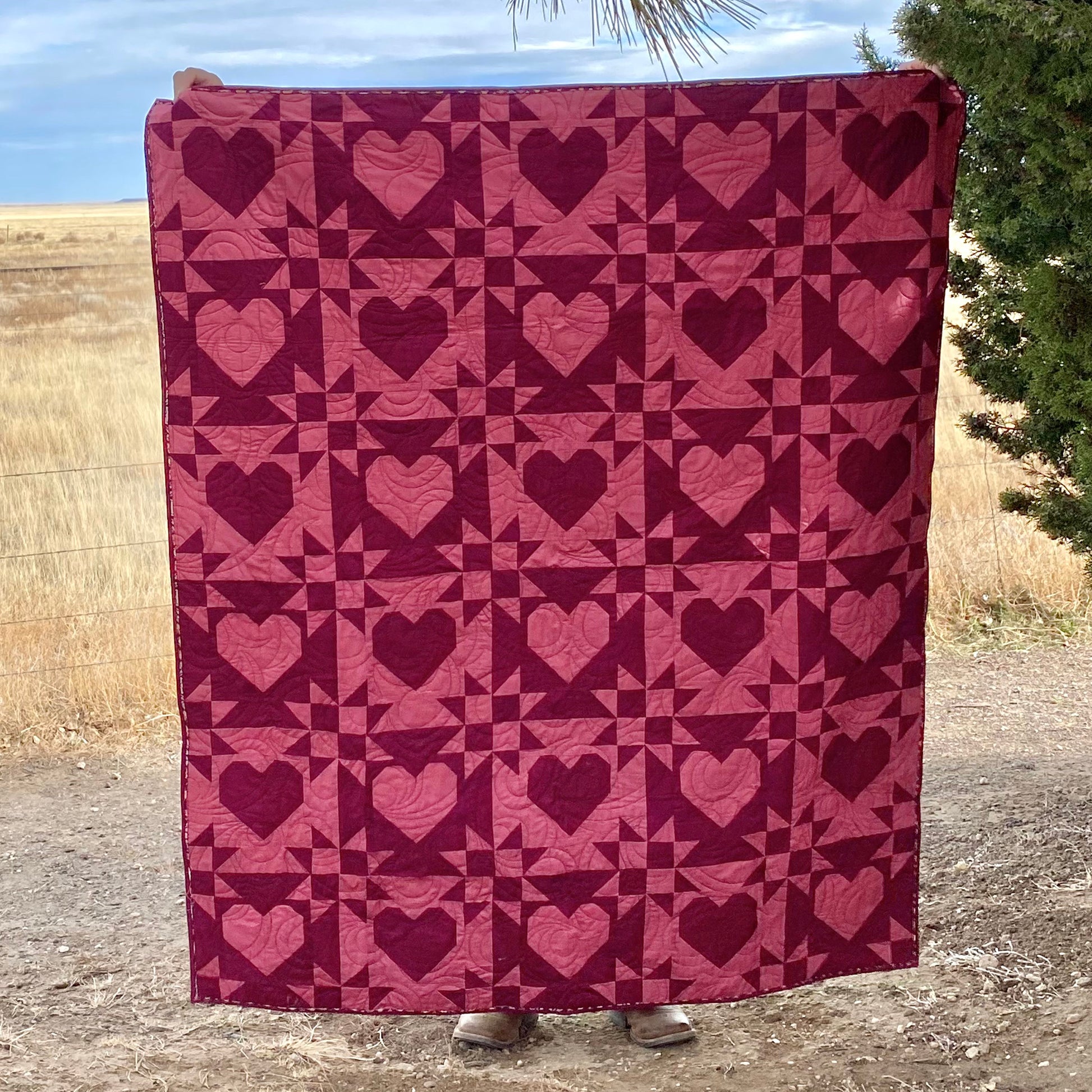 Fall in love with the Lacey Hearts quilt! This fat quarter-friendly pattern features delicate, lace-inspired hearts.