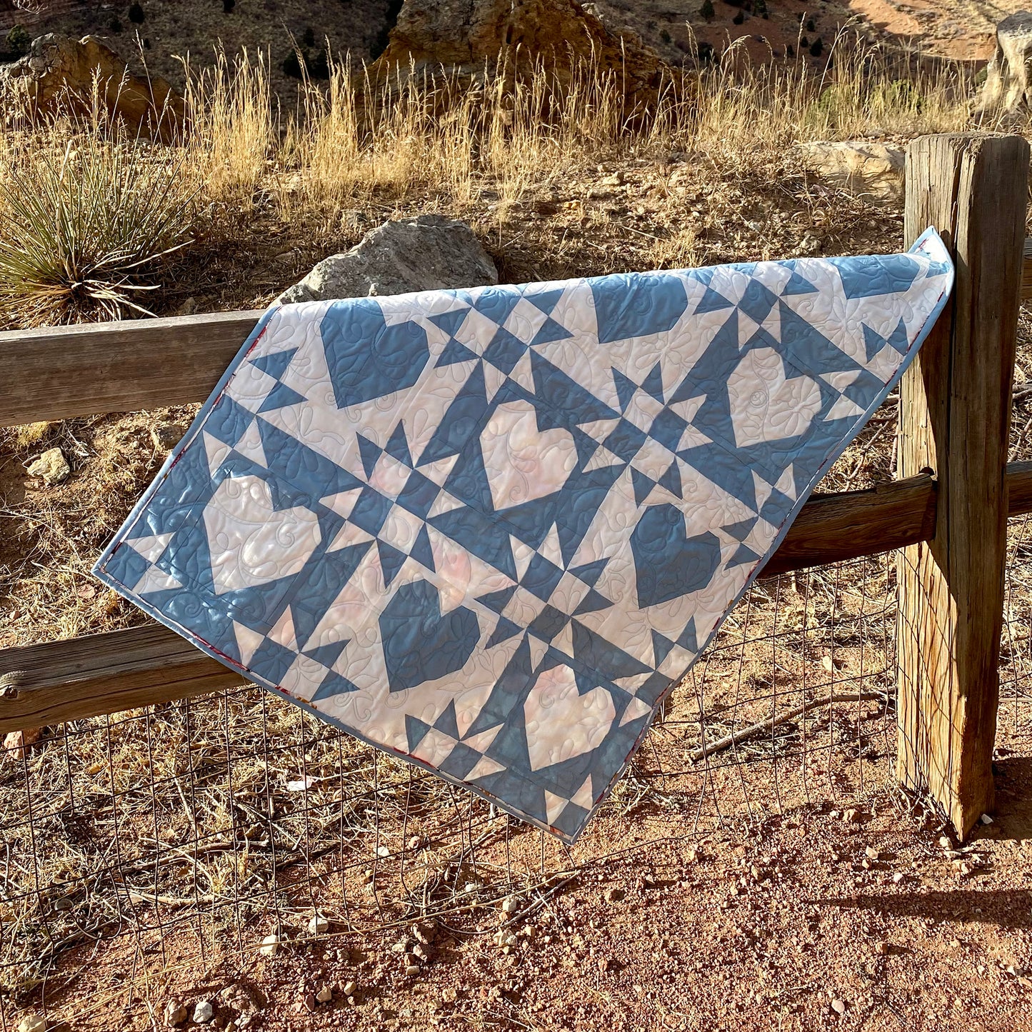 Fall in love with the Lacey Hearts quilt! This fat quarter-friendly pattern features delicate, lace-inspired hearts.