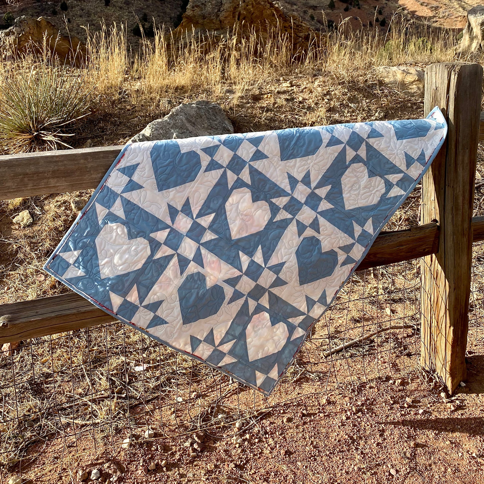 Fall in love with the Lacey Hearts quilt! This fat quarter-friendly pattern features delicate, lace-inspired hearts.