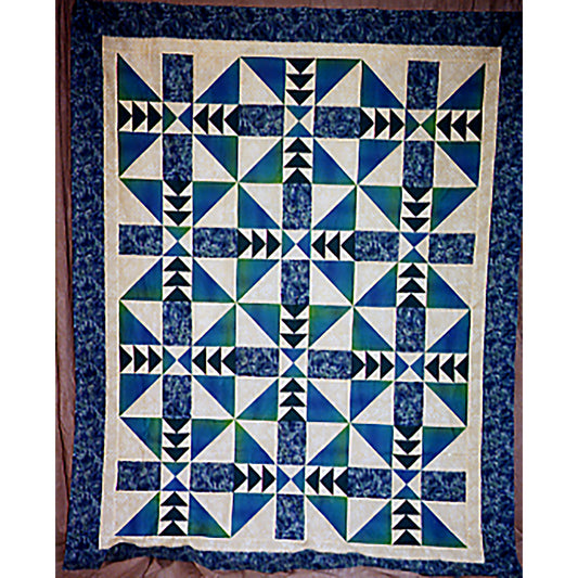  Beautiful, pieced, one-block quilt. Blocks are alternately rotated with triangles on the corners and flying geese in the middle.