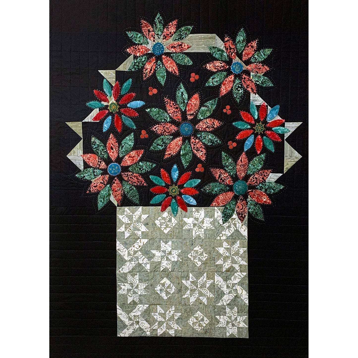 Beautiful quilt features a basket of sampler blocks overflowing with colorful poinsettia's in lots of fun colors.