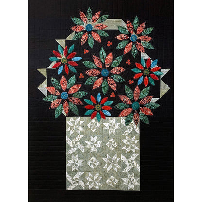 Beautiful quilt features a basket of sampler blocks overflowing with colorful poinsettia's in lots of fun colors.