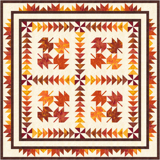 Beautiful fall quilt features maple leaves in fall colors and flying geese blocks.