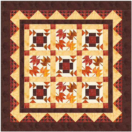 Brown, Orange and Yellow quilt featuring falling maple leaves and bright fall colors.