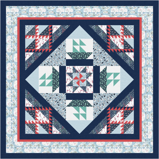 Quilt with geometric pattern on a blue floral background
