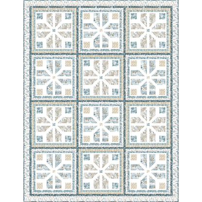 A blue, white, and tan quilt featuring a classic square pattern. Each square has a fun snowflake feel design inside. It's very elegant looking.