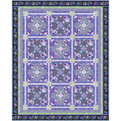 Beautiful quilt in purple with lots of details in the fabric and block designs. t's a three by four design with two different blocks staggered. 