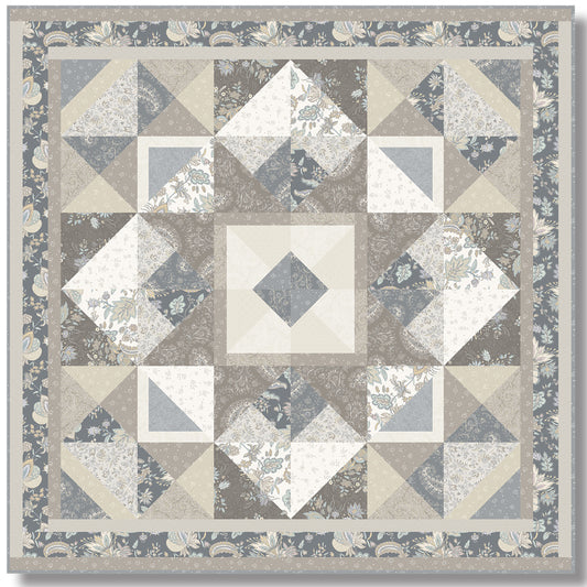 A quilted square featuring a stylish gray and white design. Has an artistic or modern feel. Great masculine quilt, too.