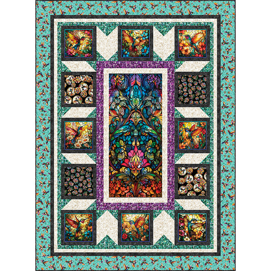 Hummingbird Lane quilt is a bright and fun quilt featuring humming bird fabric in bright colors from the middle panel to the blocks bordering it.
