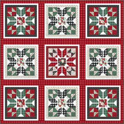 Holiday Wishes quilt by Matthew Pridemore of The Whimsical Workshop is a festive, holiday quilt. Fun stars in red and green fabrics.