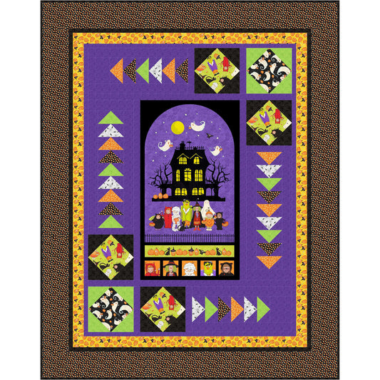 Halloween-themed quilt with colorful patterns and a haunted house design on a purple background.