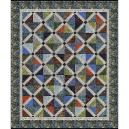 Colorful quilt with geometric pattern on a textured background
