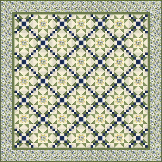 Quilt with geometric diamond pattern in green, blue, and white on a floral border