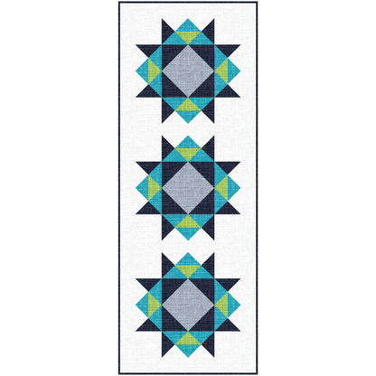 Quilted table runner with geometric pattern on a white background