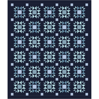 Quilt with blue geometric pattern on a dark background