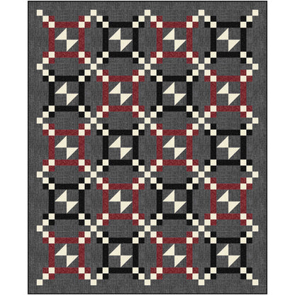 Fun and Funky quilt featuring half square triangle blocks that give the impression of bow ties in frames. 